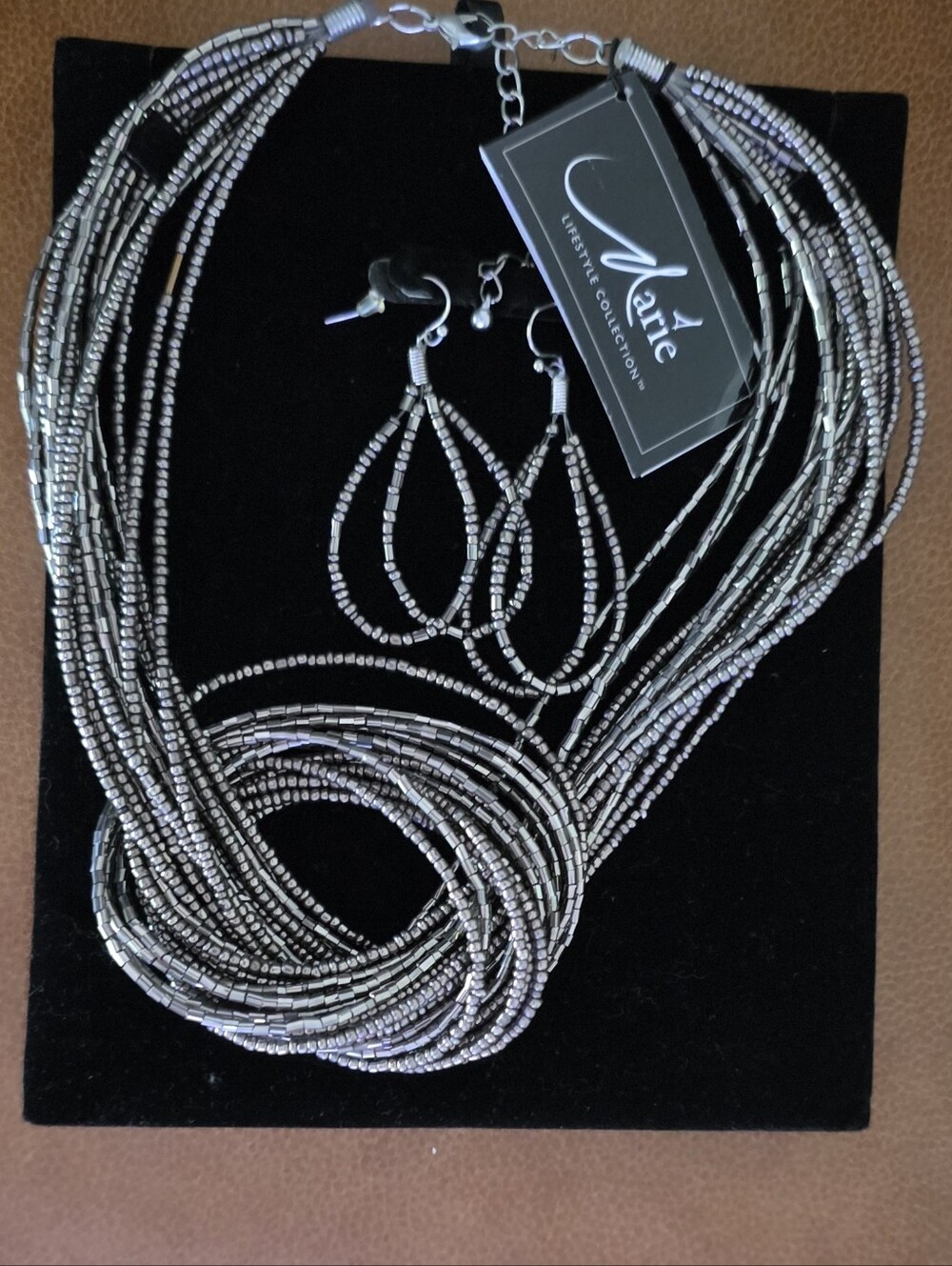 Marie Lifestyle Collection. Silver Multi-Strand Beaded Necklace with Earrings.
